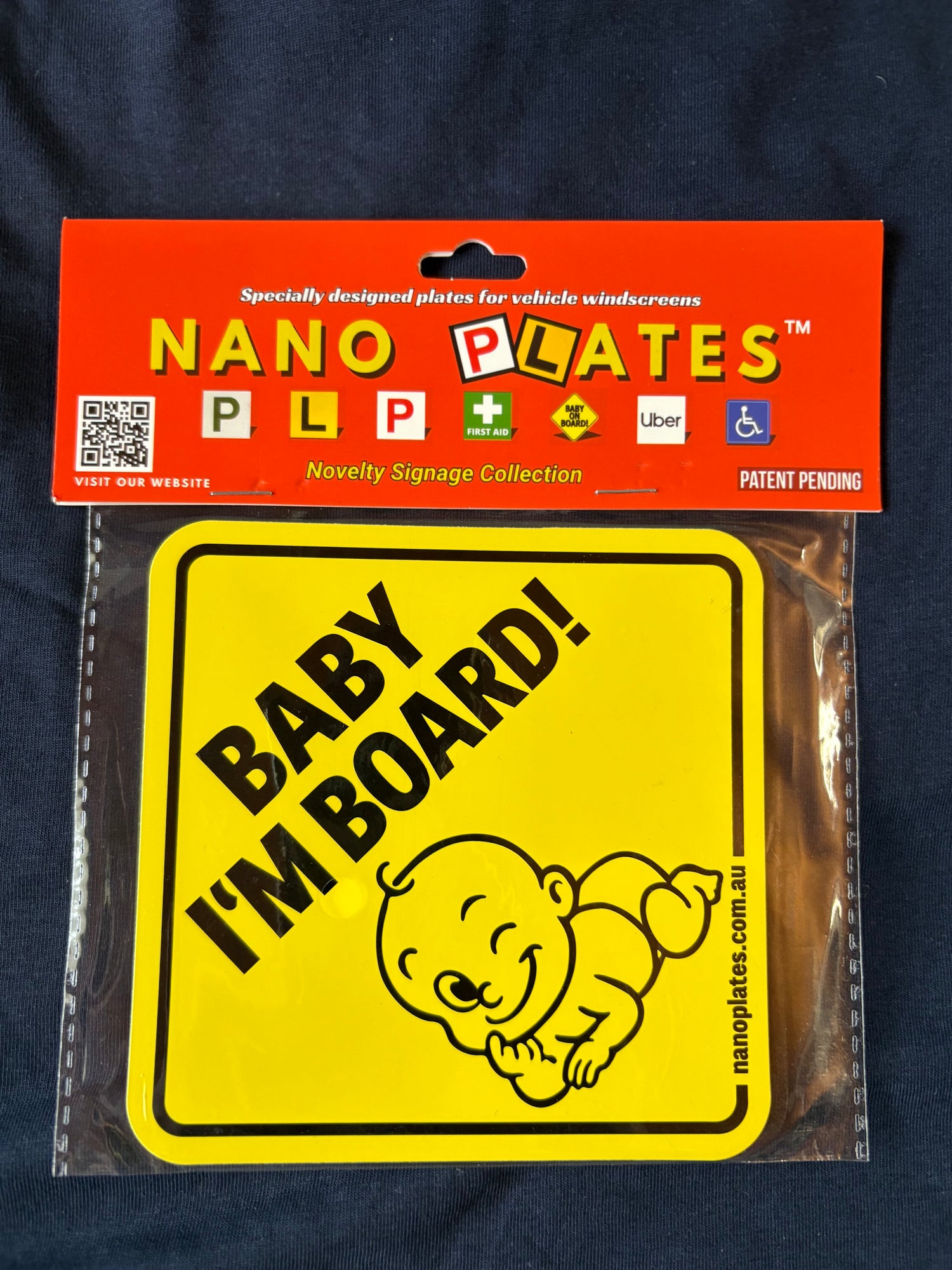 Nano Plates 'Baby, I'm Board!' sign in packaging