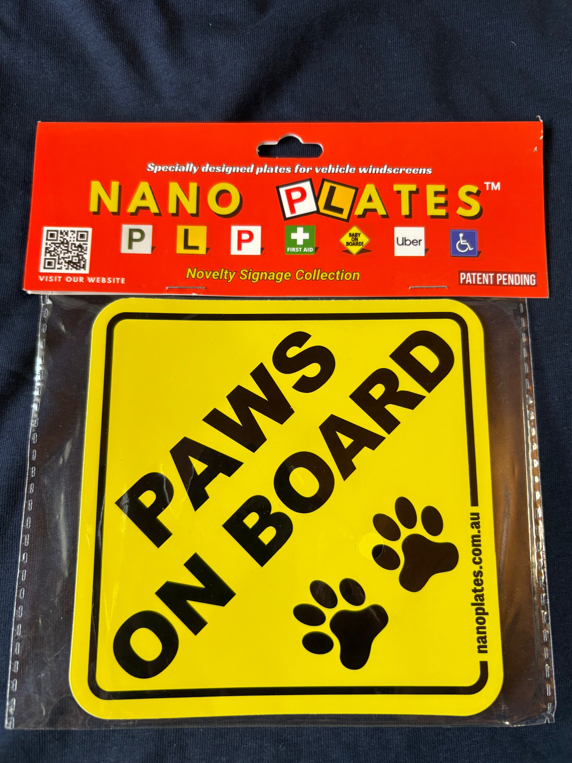 Nano Plates 'Paws on Board' sign in packaging with nanoplates label